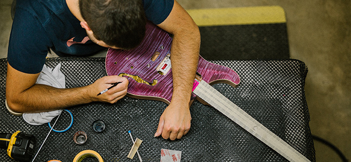 PRS Employee with Guitar